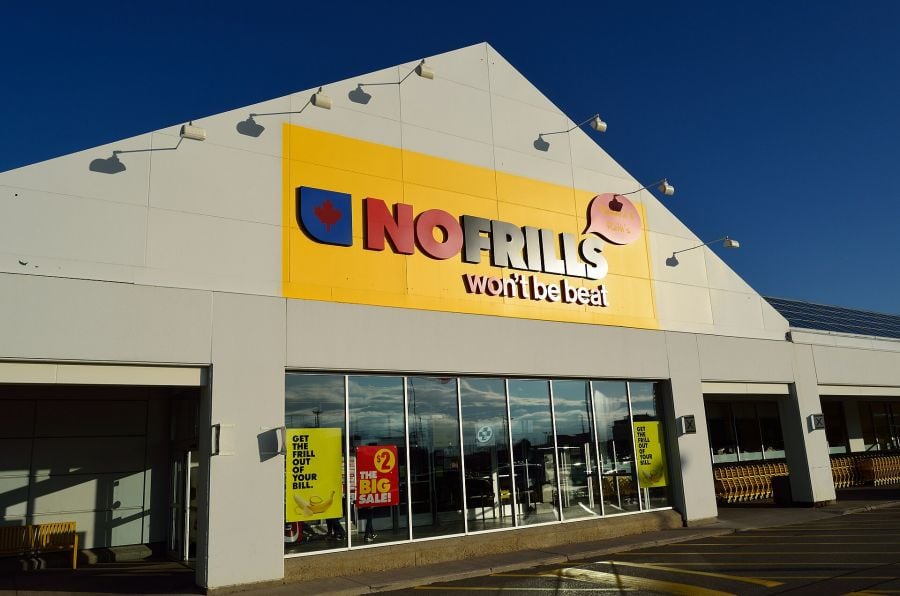 <who>Photo Credit: Wikipedia</who>A No Frills storefront in Markham, Ontario.