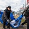 Past and current homeless converge to clean prominent Penticton encampment