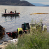 Asphalt clean-up ordered after truck crashes into Okanagan Lake
